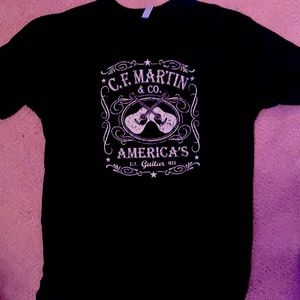 Martin & CO. Guitar shirt. Black with gold letters.